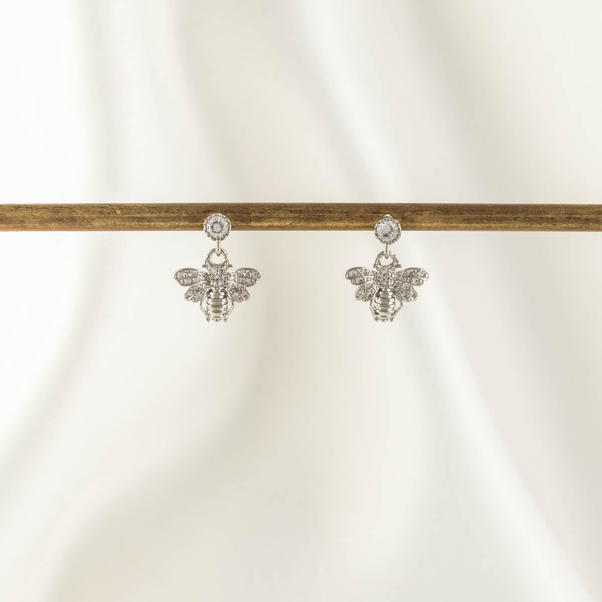 Queen Bee White Zircon Embellished Dangle Studs