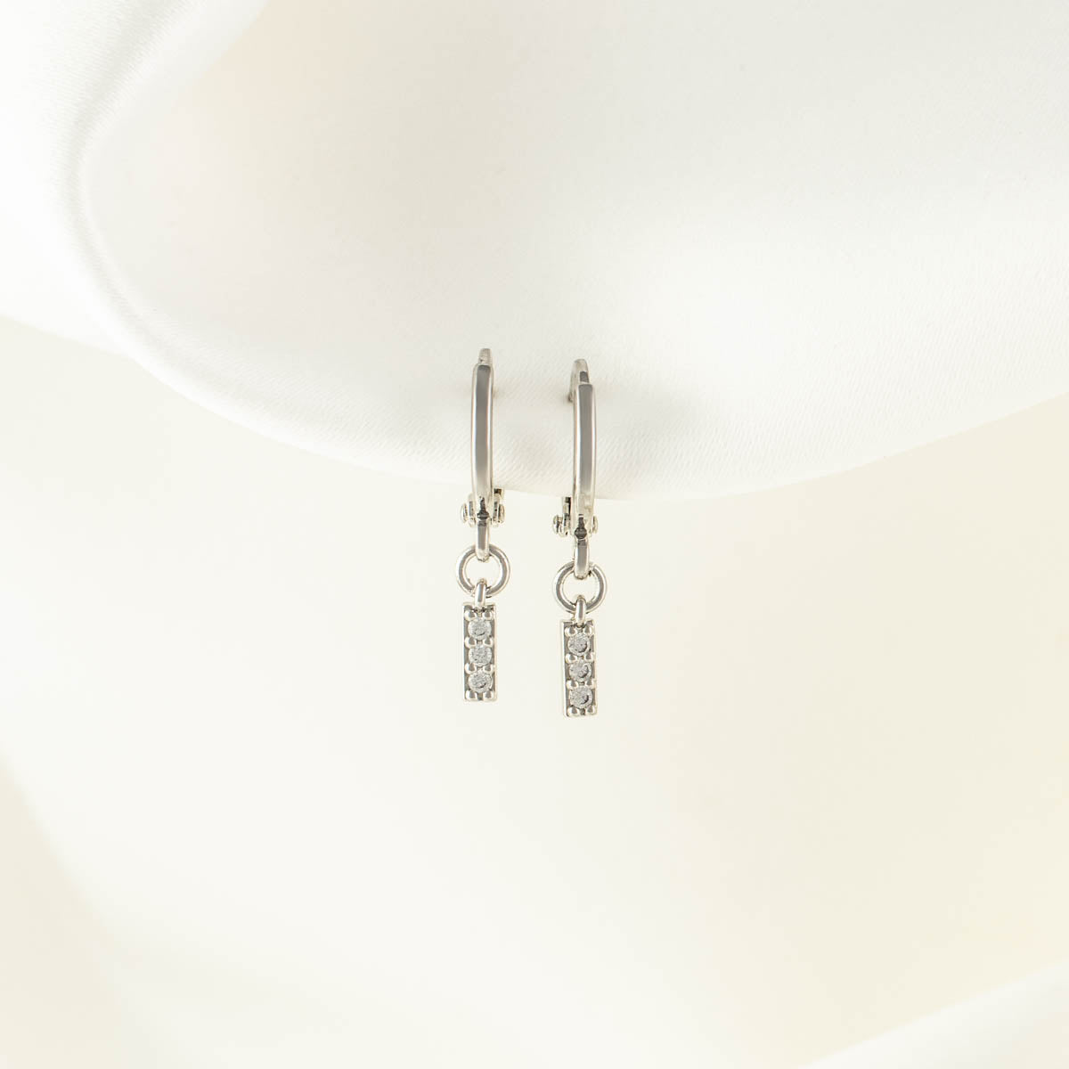 Rayne White Zircon Huggie Earrings